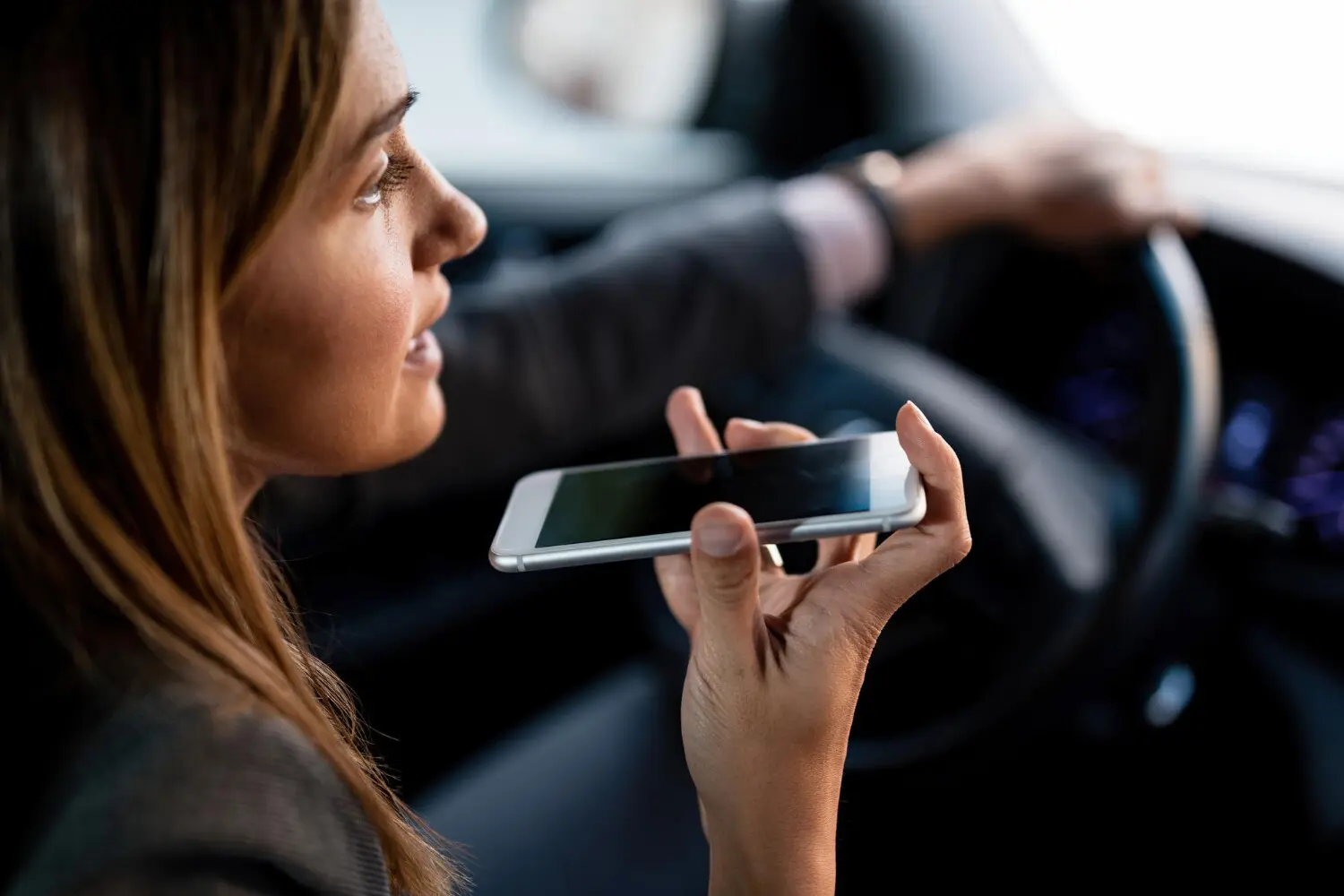 Woman talking on the phone while driving